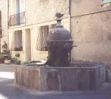 A fountain next to the church
